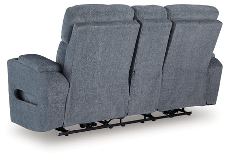 Ambient blue LED lighting on loveseat base and storage areas