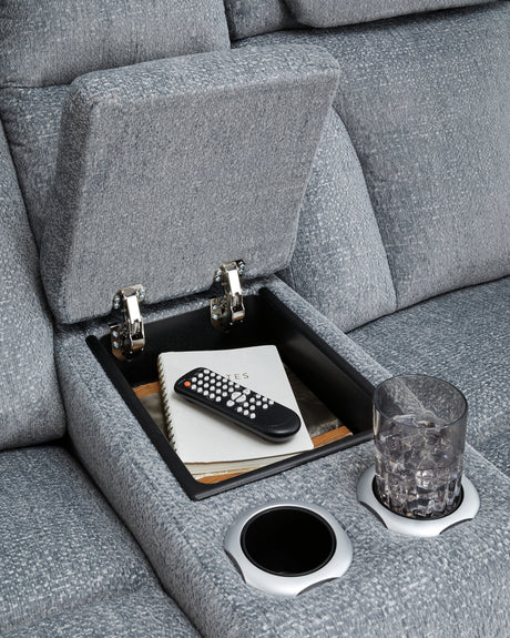 Cup holder and storage compartment on sofa arm