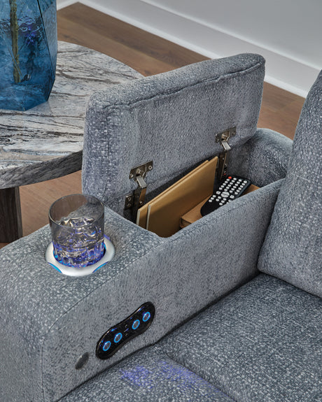 Storage armrest with cup holders