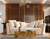 Detail of loveseat arm with gold leather