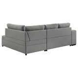 Roanne grey fabric upholstered sleeper sectional sofa angled view with chaise
