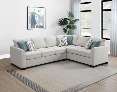 Six decorative pillows arranged on sectional