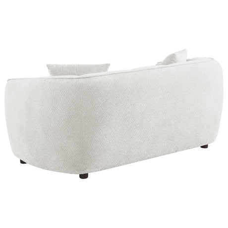 Dark brown wooden legs supporting loveseat