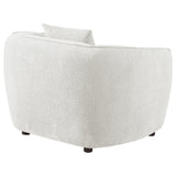 Focus on plush foam cushions and sinuous spring support of Aleisha chair
