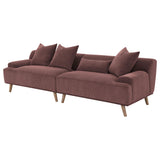 Close-up detail of wine red corduroy fabric upholstery