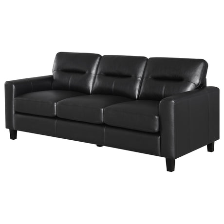 Detailed close-up of Scotland black faux leather upholstery