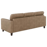 Close-up detail of Scotland brown faux leather sofa