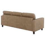 Front view of Scotland brown faux leather sofa in room