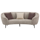 Ellorie upholstered beige curved channel back sofa side view