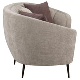 Ellorie upholstered beige curved channel back sofa full front view