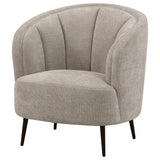 Close-up of beige velvety fabric upholstery on Ellorie chair