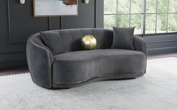 Side view of Brookside dark grey velvet curved upholstered sofa