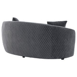 Brookside loveseat showing sloping arms and gold trim