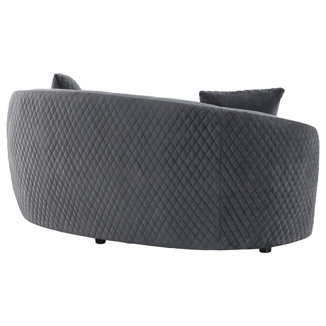 Brookside loveseat showing sloping arms and gold trim