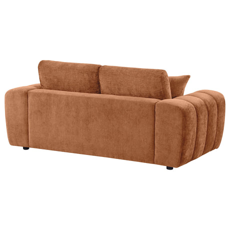 Burnett loveseat seat cushion and wood leg close-up