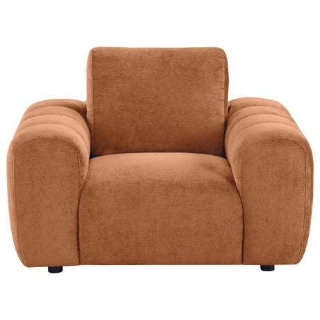Burnett accent chair side view showing rounded silhouette