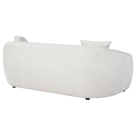 Detail view of sofa legs and upholstery