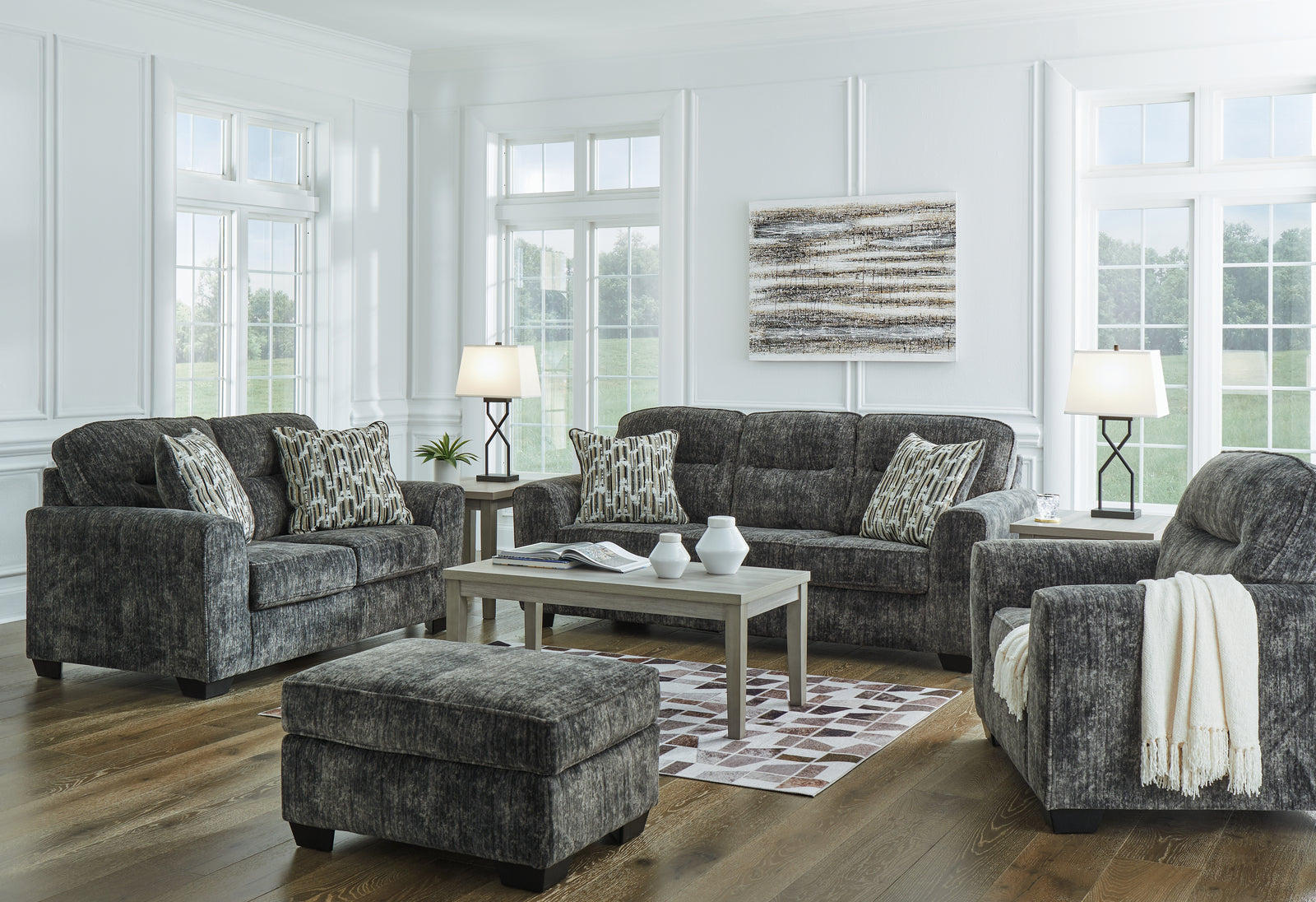 main view of Lonoke Gunmetal Sofa, Loveseat, Chair and Ottoman furniture