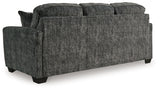 Side profile of Lonoke Gunmetal Velvet Sofa