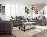 Salizar Grey Flared Arm Chair angled with flared arm detail