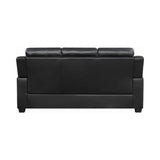 Finley black tufted upholstered sofa angled front view