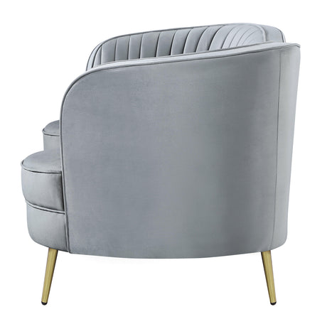 Side angle of Sophia upholstered loveseat showing tufted camel back