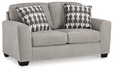 Side angle of loveseat with flannel fabric