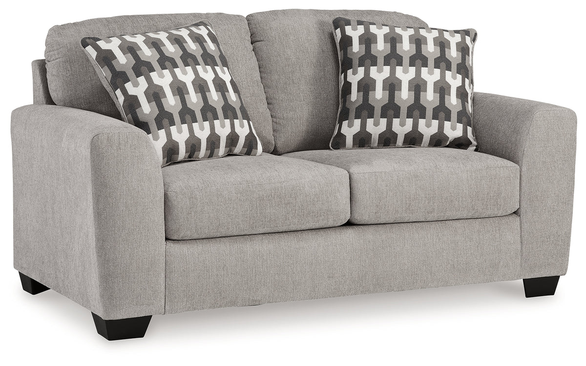 Side angle of loveseat with flannel fabric