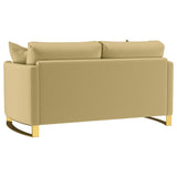 Side profile of the Corliss sofa in camel velvet upholstery