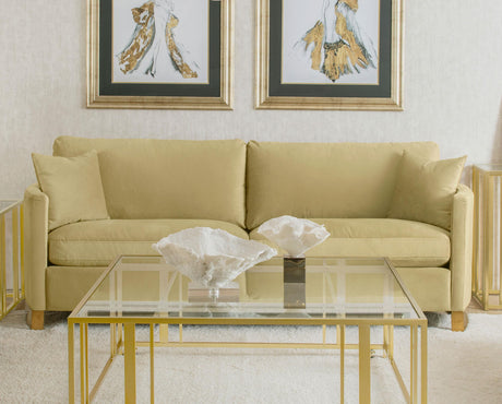 Side view of Corliss camel fabric curved track arm sofa