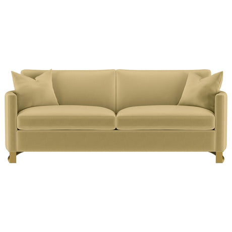 Close-up detail of the camel velvet upholstery on Corliss sofa