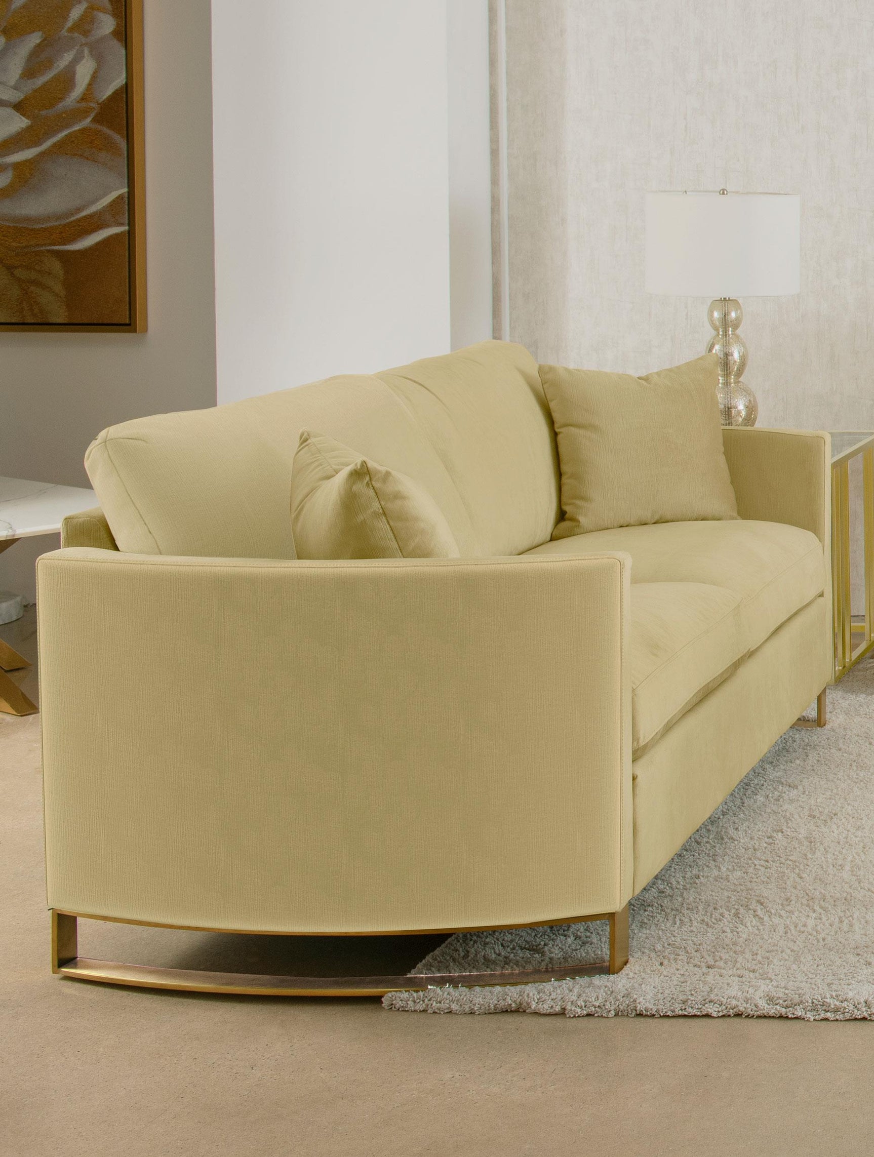 Side view of Corliss camel velvet loveseat