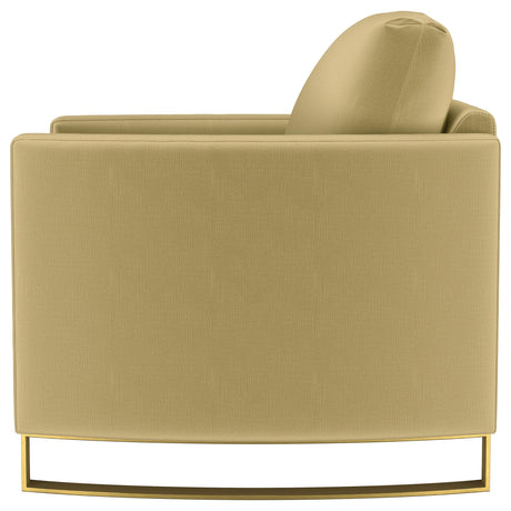 Corliss Upholstered Curved Track Arm Chair in camel velvet, angled view