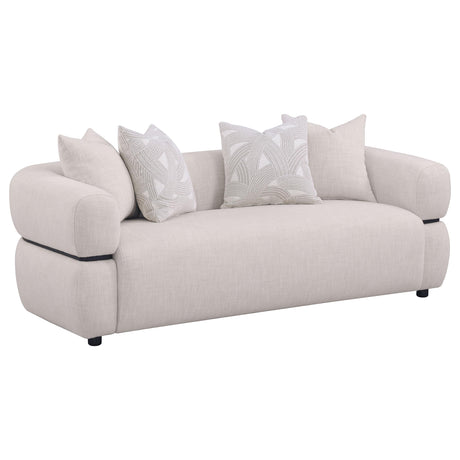 Side view of Jeanette beige fabric sofa set with round arms