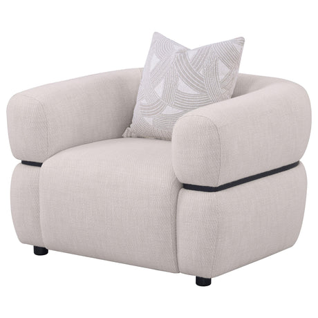 Close-up of beige textured fabric upholstery on accent chair