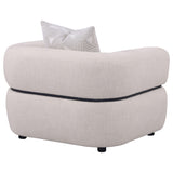 Wide arched armrest of Jeanette chair in beige fabric