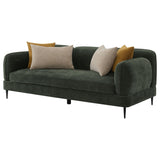Close-up detail of green fabric upholstery on Soba sofa