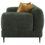 Green loveseat with yellow and beige accent pillows