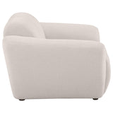 Low padded back with grid-like tufting on Destino accent chair