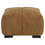 Close-up on amber fabric texture and tufting of Octavia ottoman