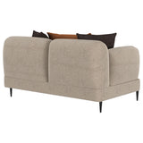 Seating area close-up with foam cushions and pillows