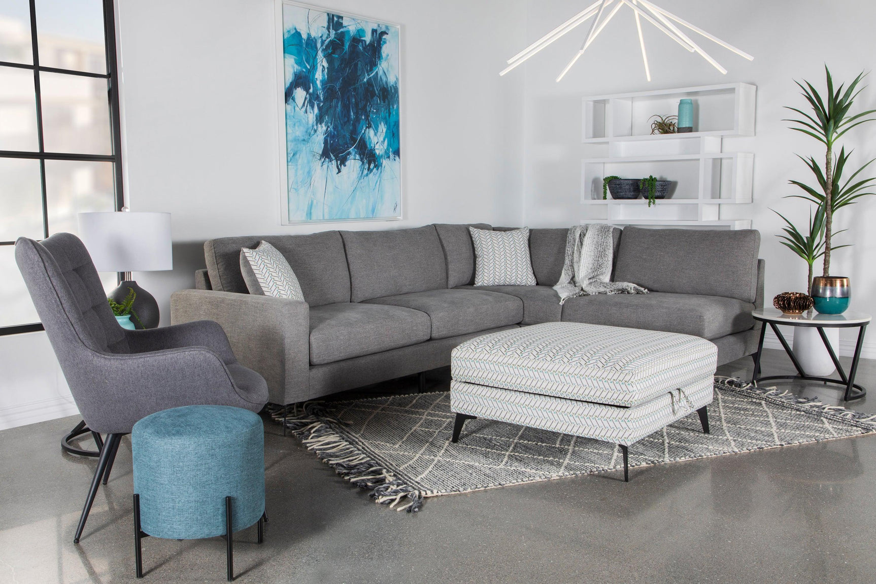 Clint ottoman in living room with geometric fabric upholstery
