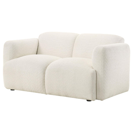 Detail of white fabric upholstery and stitching on Dorset loveseat