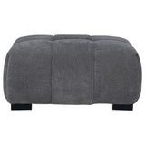 Close-up of charcoal grey fabric and tufting on Octavia Ottoman