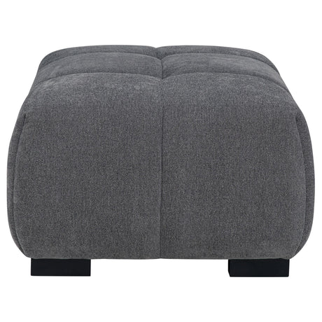 Octavia Ottoman showing sturdy wooden legs and texture