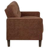 Close-up of rust fabric and cushioning on Bowen II sofa set