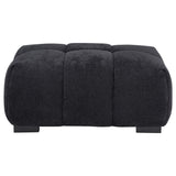 Side view of Octavia rectangular ottoman with black fabric upholstery