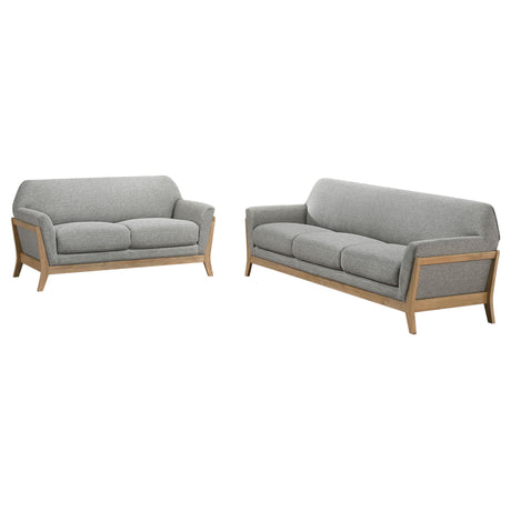side view of Vaughn grey fabric upholstered sofa and loveseat set