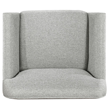 Side view of sofa with flared arm design