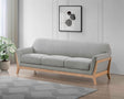 Side view of Vaughn grey fabric sofa with flared arms